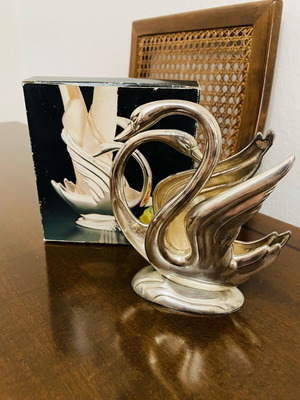 Vintage silver-plated napkin holder used with natural patina
