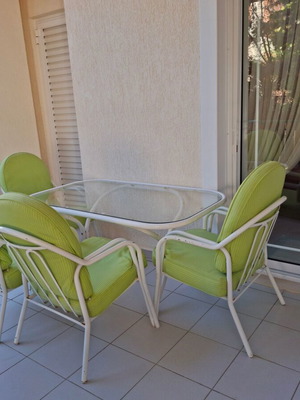 Garden dining set with 4 chairs and cushions used