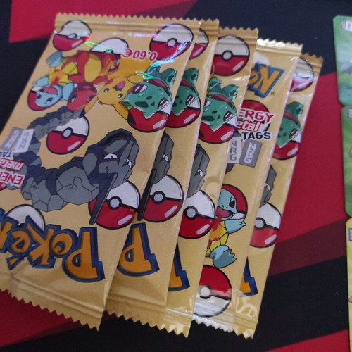Pokemon tags caps new with 5 sealed packets