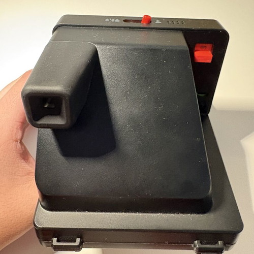 Polaroid One Step Plus instant camera with 1 film pack