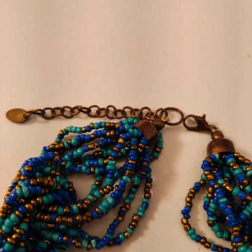 Statement necklace like new with blue and gold braided seed beads
