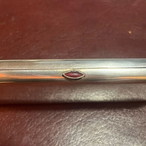 Silver cigarette case used with red stone and gold plating