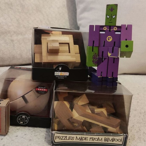 Wooden Puzzle Set like new with various difficulty levels