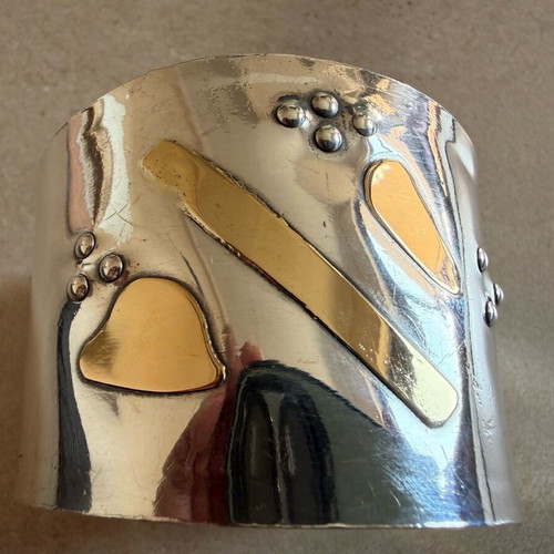 Silver and gold bracelet jewelry used