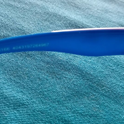 Uvex Kids Sunglasses polarized with blue arms and clear frame like new