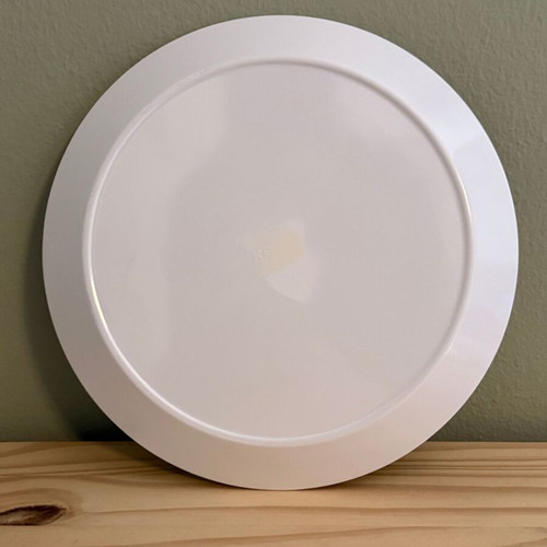 Plastic plate used with black and white flower design 27 cm