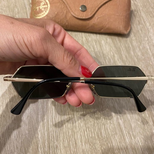 Ray Ban sunglasses like new, gold with unique shape