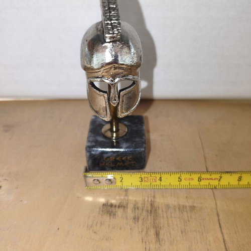 Metal miniature of ancient Greek helmet with marble base new
