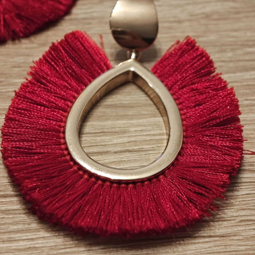 Earrings long like new with red threads and gold details