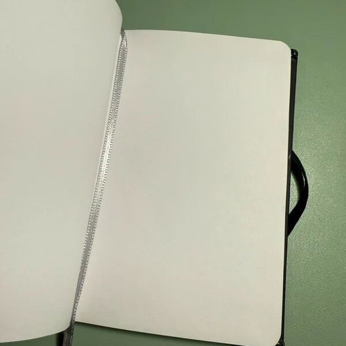 Stationery set with notebook, pen, highlighters, clips, and post-it notes