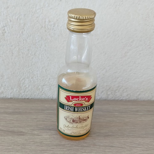Locke's Irish Whiskey small promotional bottle used