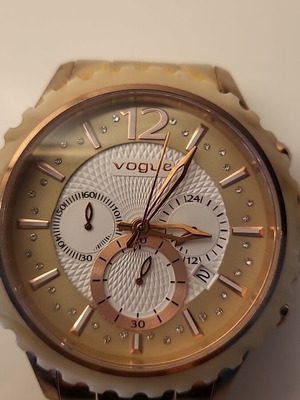Vogue watch with bracelet and pink gold zircon dial like new