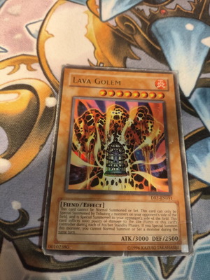 Lava Golem Yu-Gi-Oh card used, damaged condition, Ultra Rare DR1