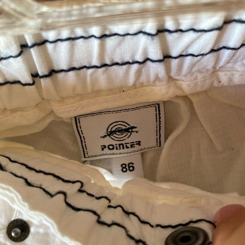 White bermuda shorts new with light stain, kids