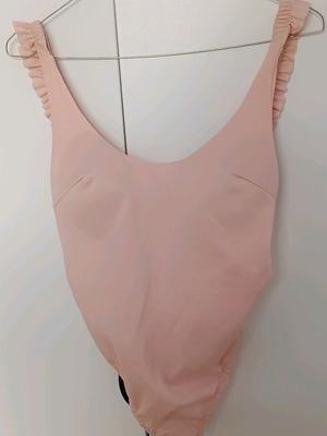 Pink backless bodysuit like new with cups size M
