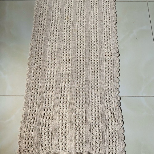 Handmade crocheted table runner used with cotton thread
