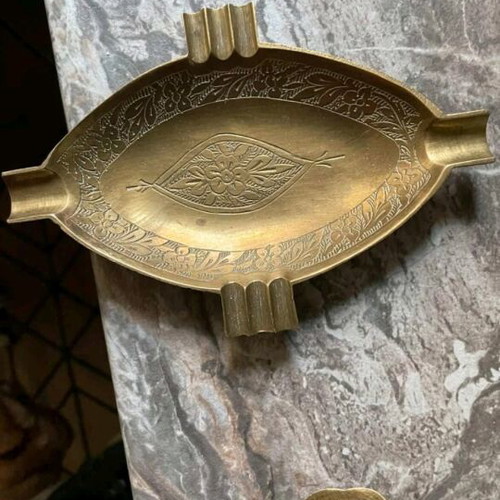 Vintage brass ashtray like new with carved design