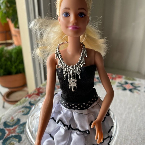 Collectible Barbie doll like new, well preserved and clean
