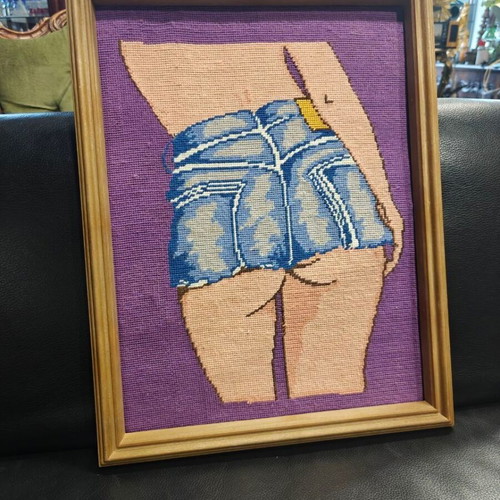 Framed gobelin woman in short denim shorts on purple background used