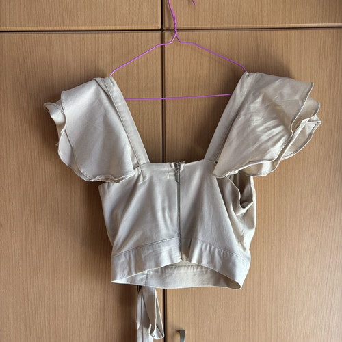 Zark beige top with asymmetric design and built-in bust support