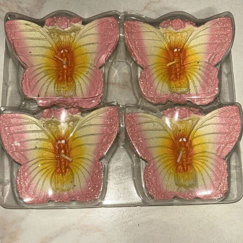 Butterfly candle like new, pack of 4 pieces