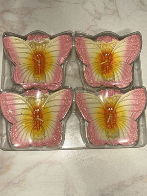 Butterfly candle like new, pack of 4 pieces