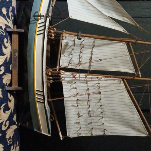 Decorative wooden ship and large handcrafted wooden boat
