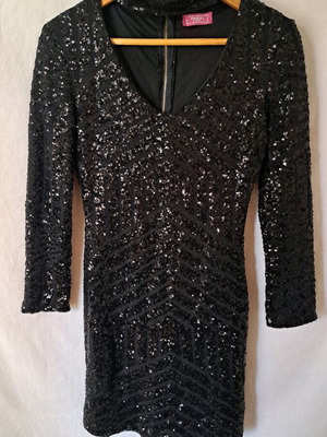 Black mini dress with sequins like new