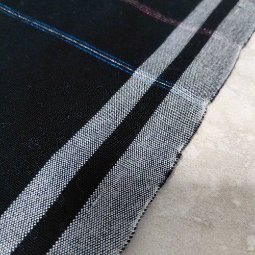 Traditional cotton fabric on loom, new, black with gray stripes and fringes