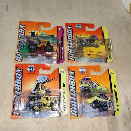 Set of 4 new sealed Matchbox construction vehicles