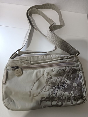 Shoulder bag used, gray color for young ages