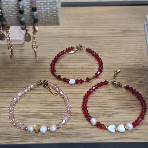 Handmade bracelet with crystals, pearls and heart-shaped coral made to order