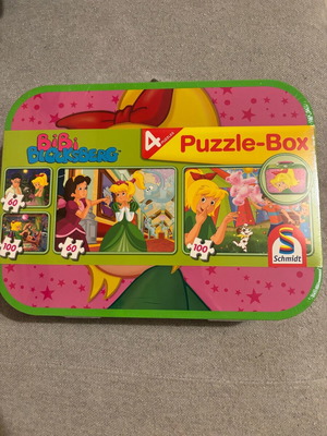 Metal box with 4 puzzles new in shrink wrap