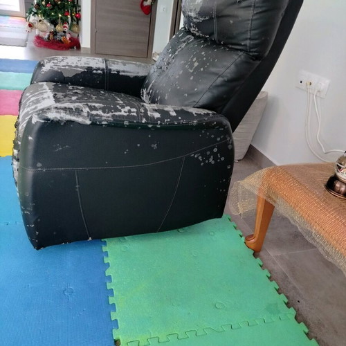 Reclining armchair refurbished leather with damage