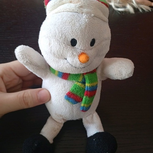 Plush snowman used with Christmas music