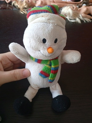 Plush snowman used with Christmas music