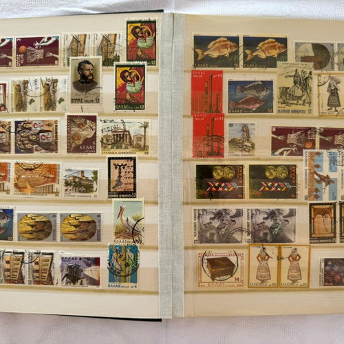 Stamp album collection about 615 stamps like new