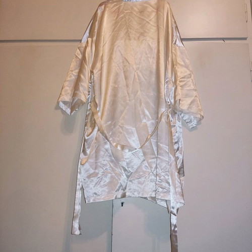 2 women's robes like new, one cream and one black with flower detail
