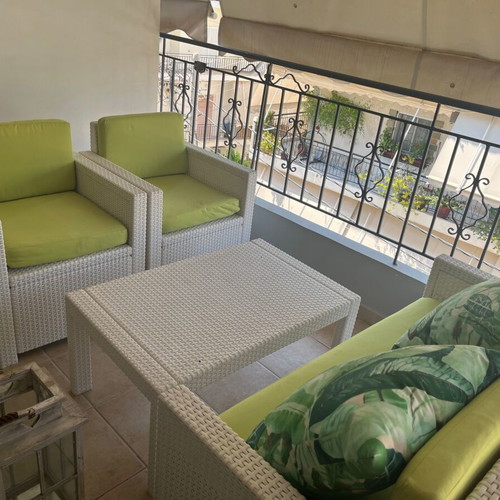 Outdoor furniture set like new with sofa, two armchairs and table