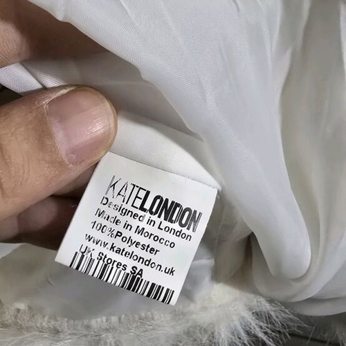 Kate London white faux fur jacket slightly used with small stain