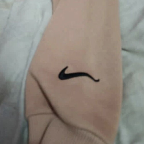 Nike women's hoodie used, beige, size Large with slim fit