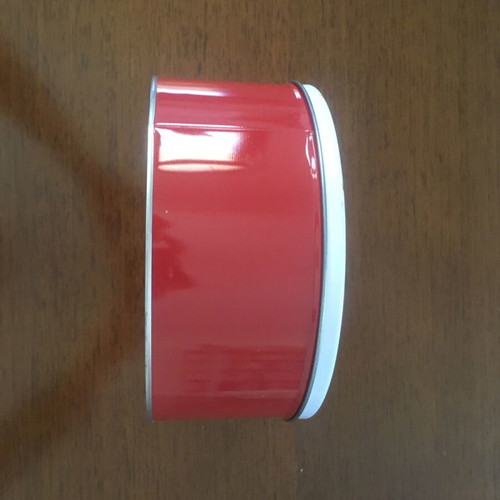 Metal tin used, round red with Munchmallows advertisement