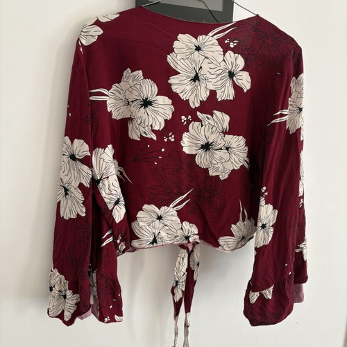 Floral shirt with sleeve openings