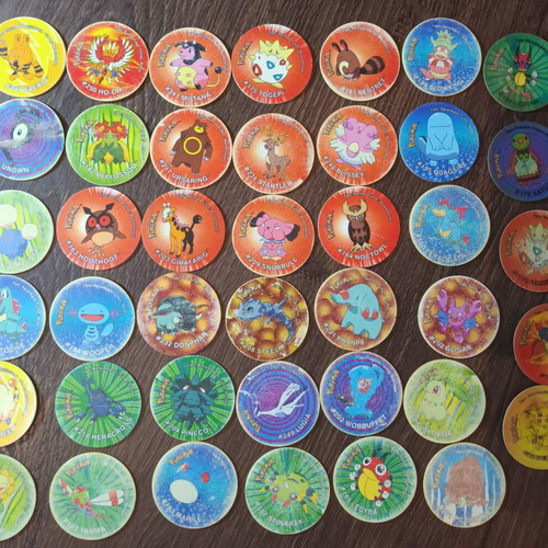 Pokemon tazos set with 36 flat and 5 3D tazos