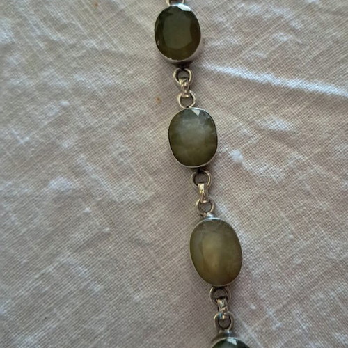 Silver bracelet with genuine green stones, like new