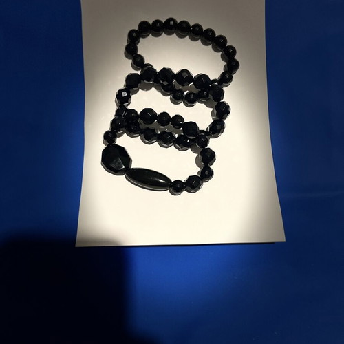 Set of 4 black beaded bracelets