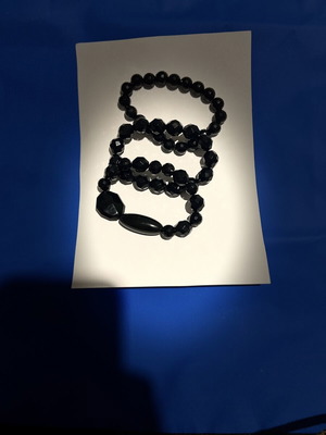 Set of 4 black beaded bracelets