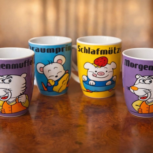 Set of 4 colorful ceramic mugs with humor like new