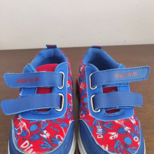 Children's shoes used, size 27, blue and red with dinosaur design
