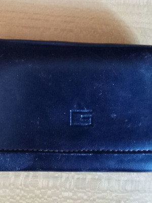 Women's black wallet used with photo and money slots